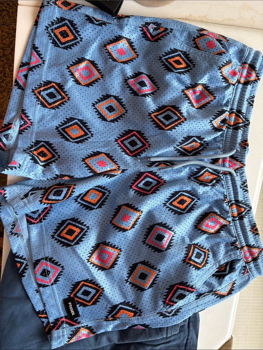 RSQ Light Blue Athletic Shorts with Orange and Pink Diamond Print